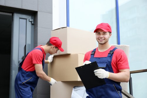 Removal team preparing a flat move in a Canary Wharf apartment building