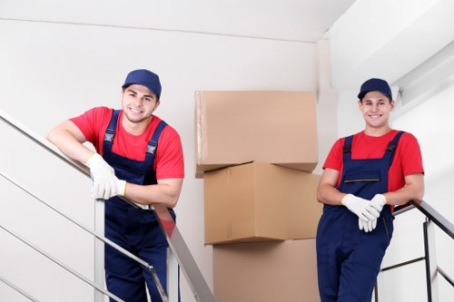 Removals team handling a same day move in a Canary Wharf apartment building