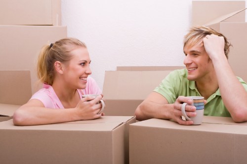 Preparing furniture for a move in a modern Canary Wharf flat