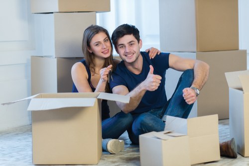 Canary Wharf moving service with van and packed boxes
