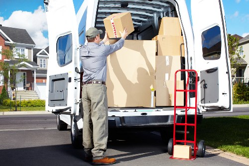 Office furniture and commercial items loaded into a removal van