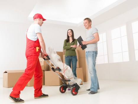 Careful unpacking and room setup in a modern docklands home